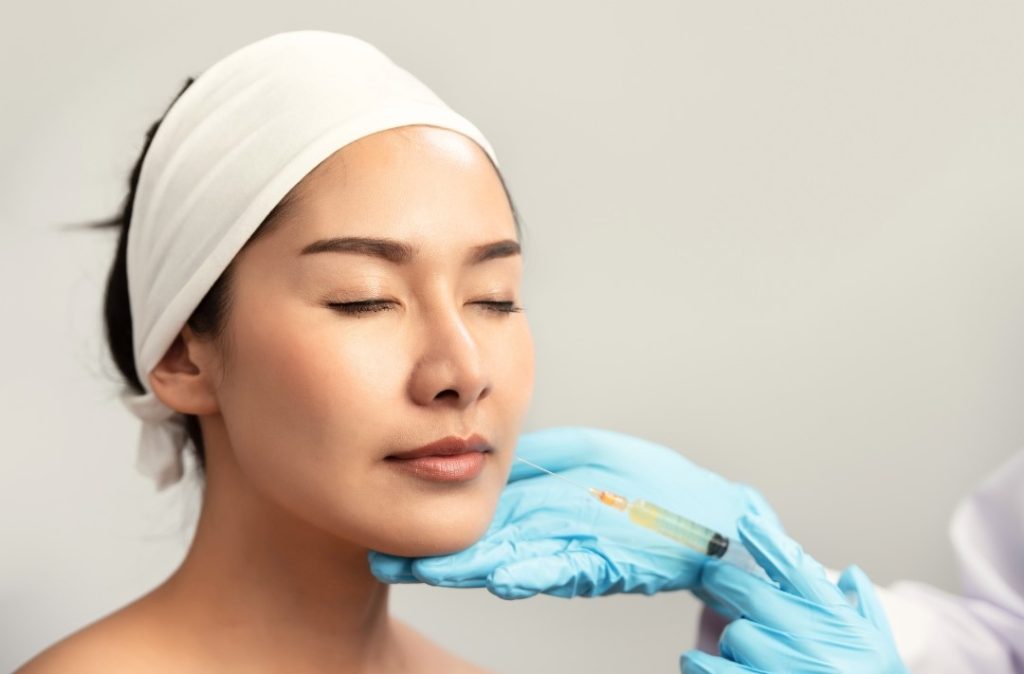 woman getting aesthetic treatment for sagging skin