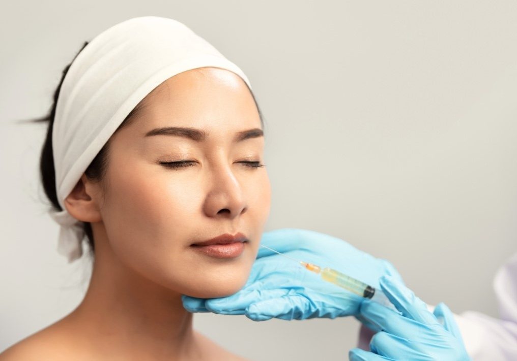 woman getting aesthetic treatment for sagging skin